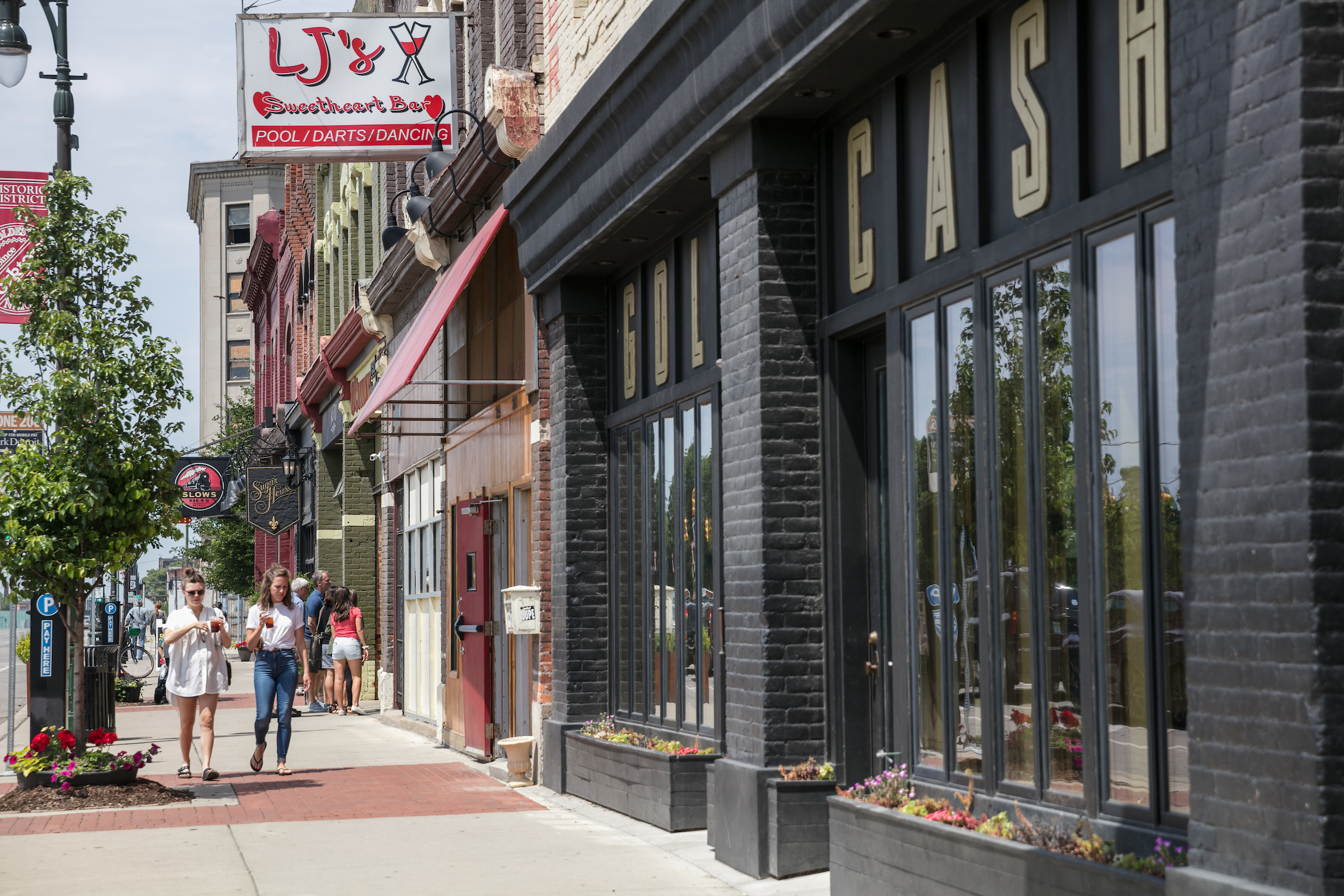 The sign for LJ’s next to the old Gold Cash Gold building.