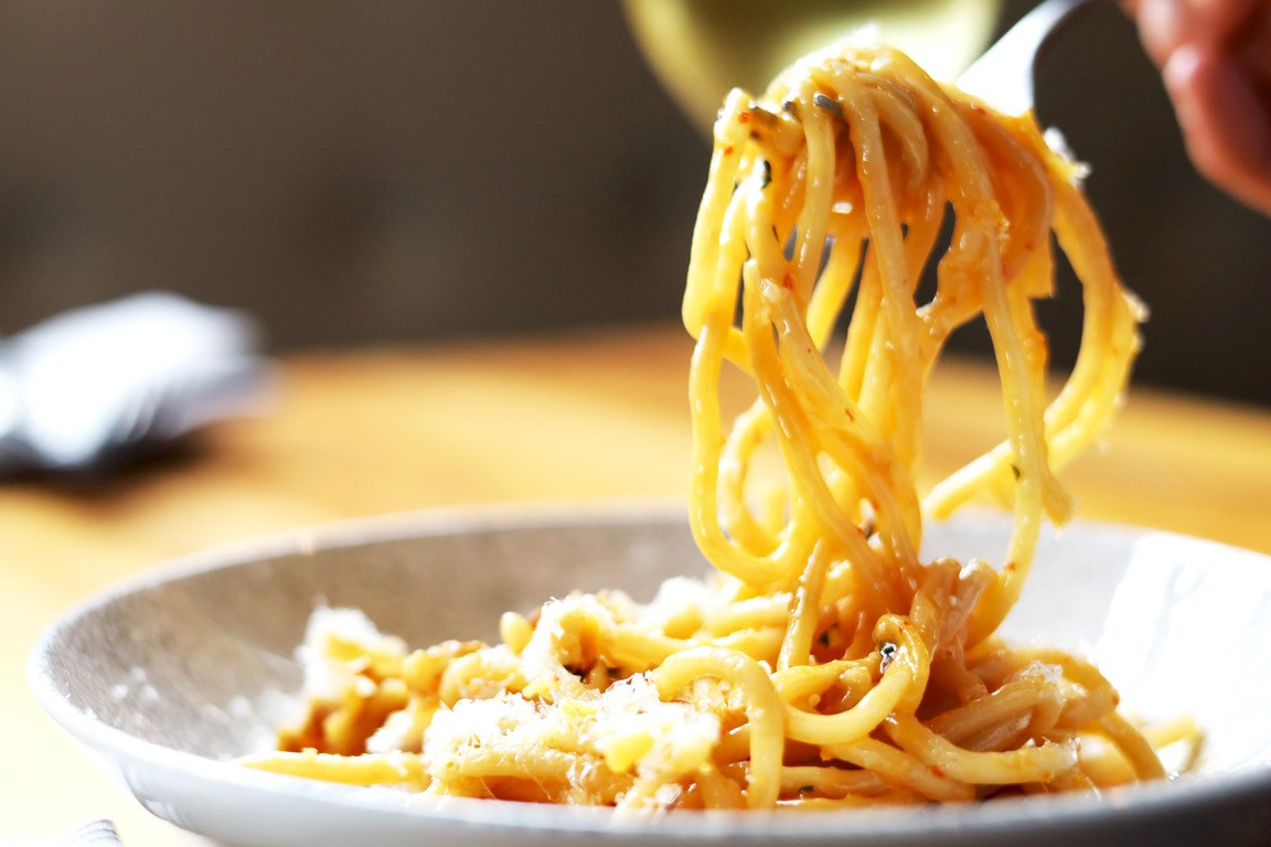 Bucatini twirled on a fork