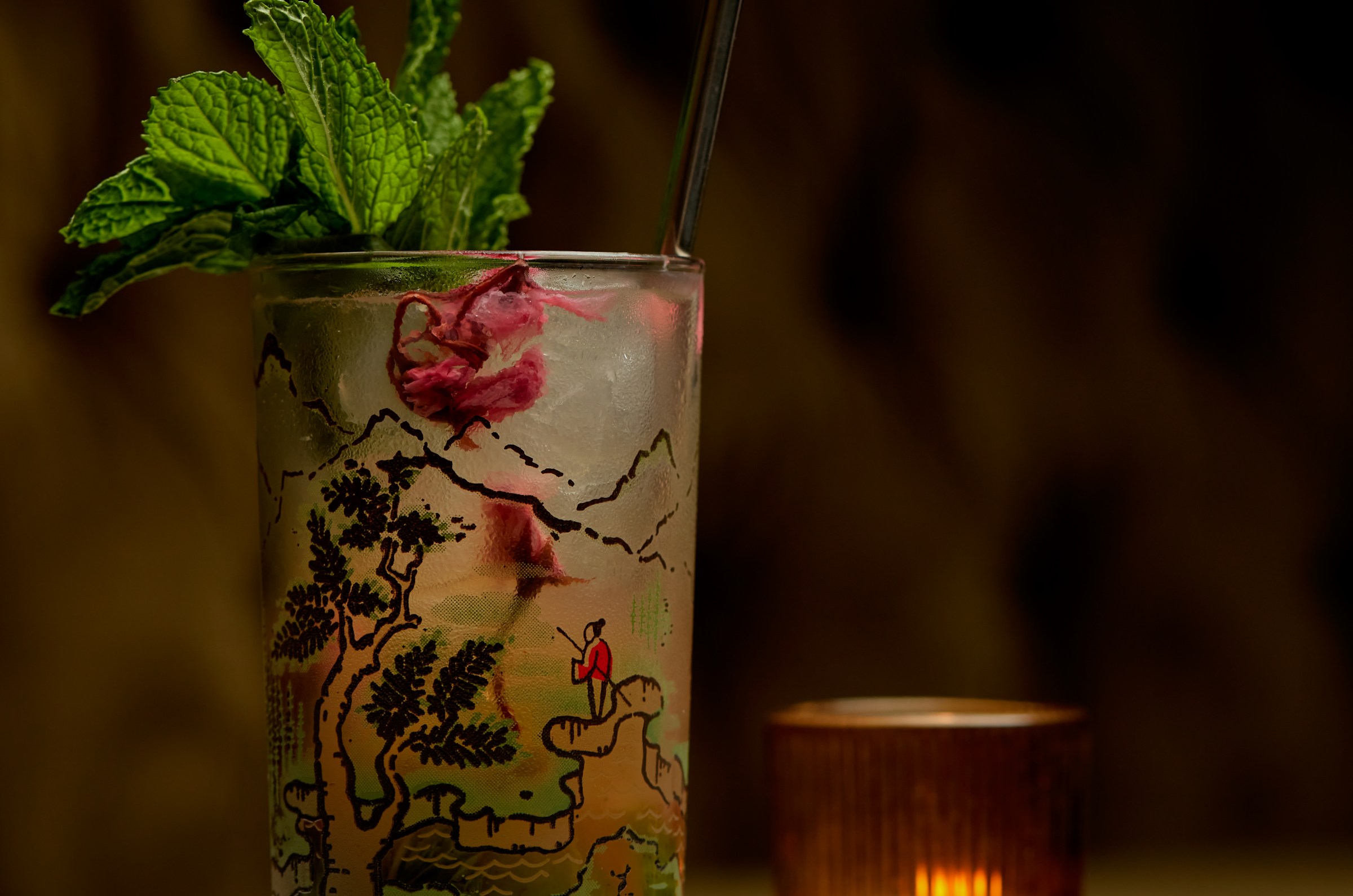 A cocktail made with rum, lime, sakura, seltzer, and mint, from Aladdin Sane in Detroit, Michigan.