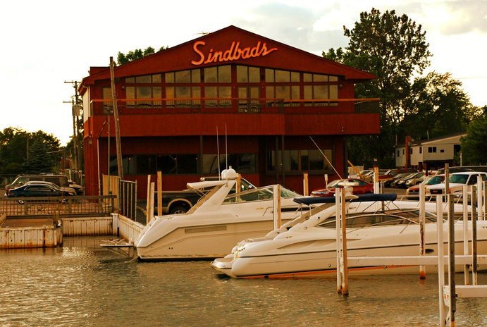 The red exterior and sign at Sindbad’s overlooking the marina.